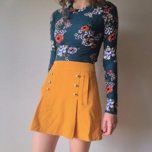 Mustard mini skirt with gold buttons